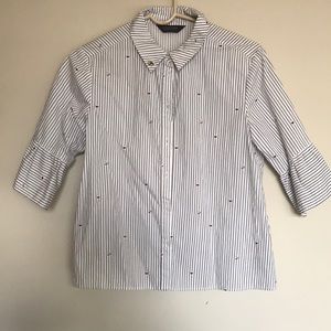 Button-up, striped shirt.